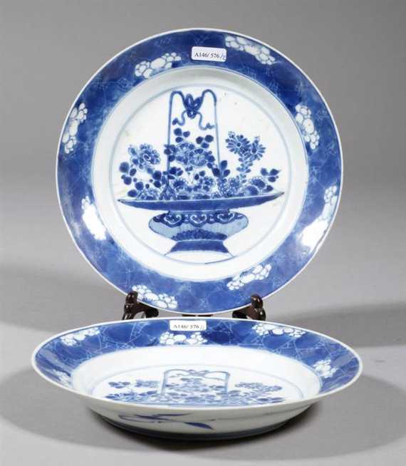 Appraisal: A PAIR OF BLUE AND WHITE PLATES WITH FLOWERBASKET DESIGN