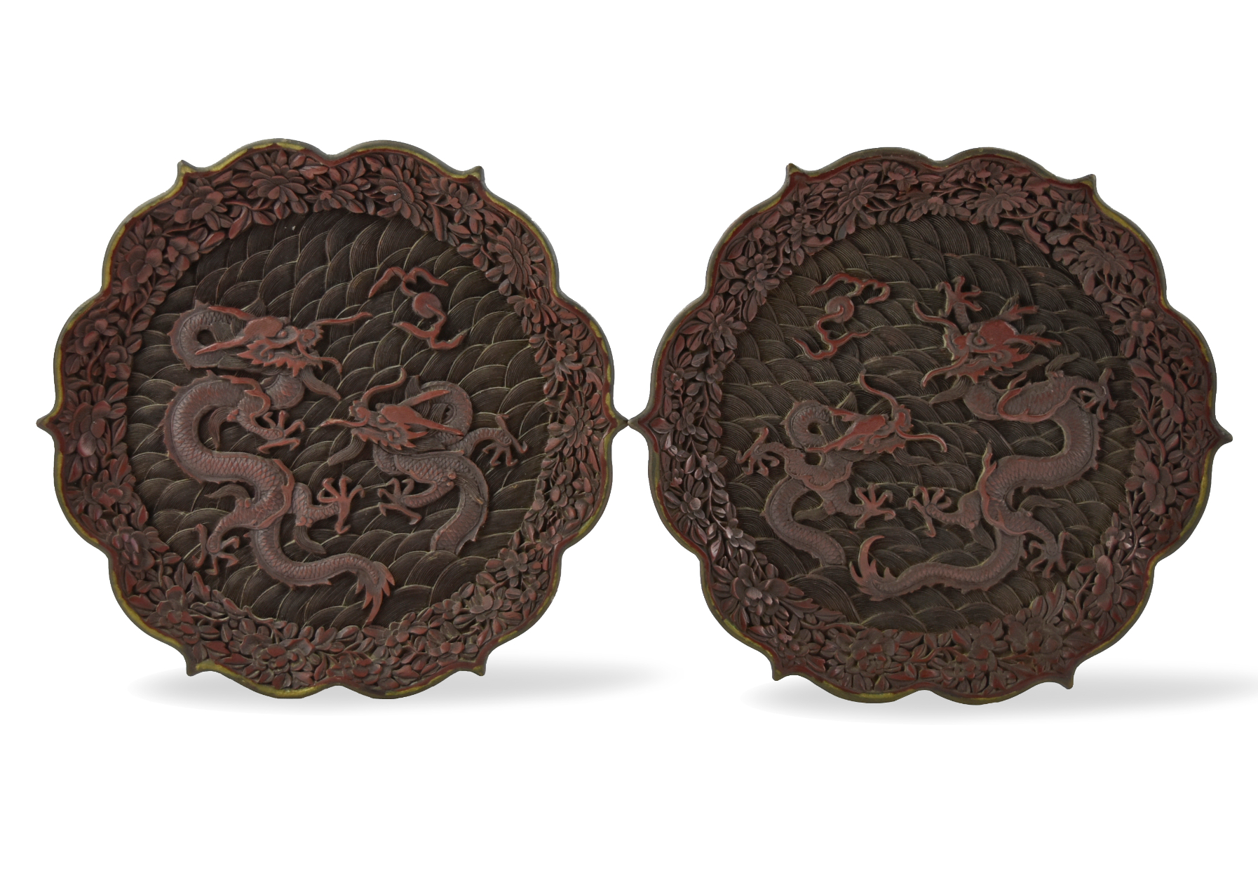 Appraisal: Chinese th C lacquer plates in floral shaped decorated with