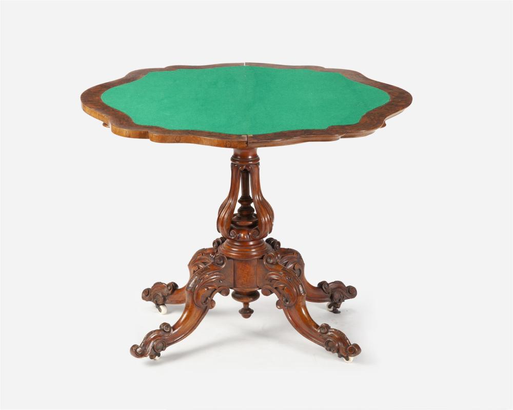 Appraisal: An English Rococo-style flip-top game table Mid- th Century The