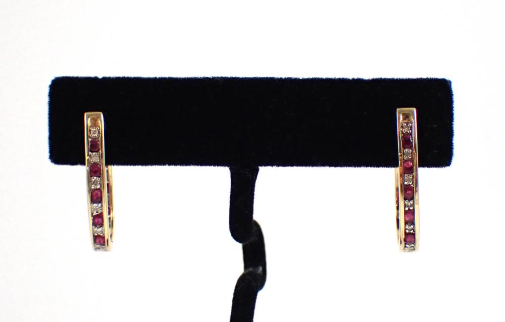 Appraisal: PAIR OF RUBY AND DIAMOND EARRINGS each k yellow gold