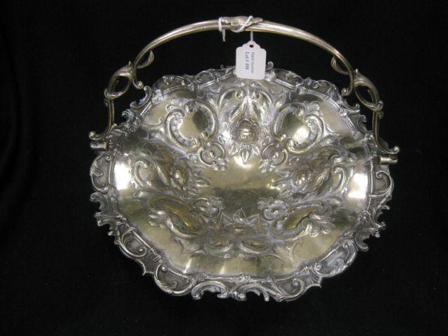 Appraisal: Victorian Silverplate Brides Basket fancy floral swing handle diameter