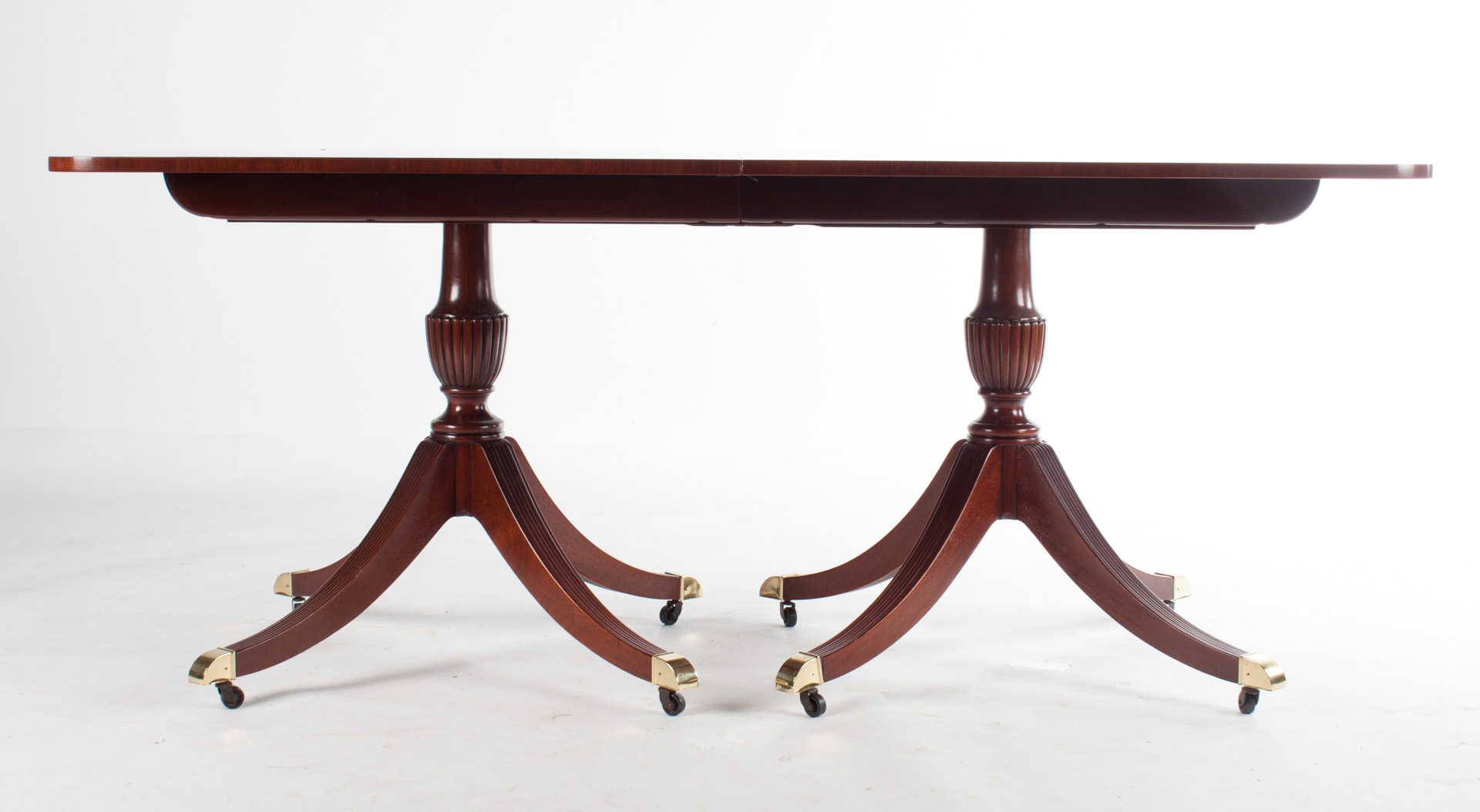 Appraisal: Baker Federal style mahogany dining table th century banded mahogany