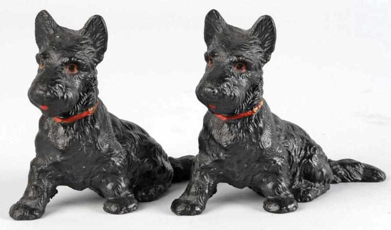 Appraisal: Pair of Cast Iron Sitting Scottie Dog Bookends Description Made