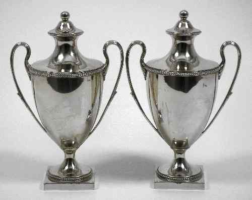 Appraisal: A pair of George III silver urn pattern cups and