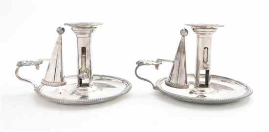 Appraisal: A Pair of George III Silverplate Pushup Chambersticks Matthew Boulton