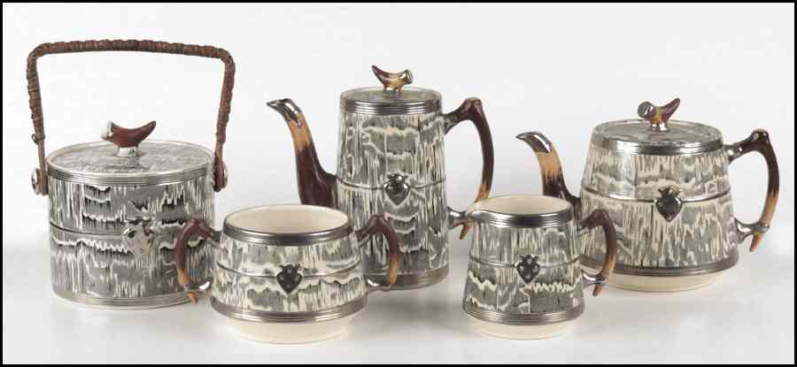 Appraisal: ARTHUR WOOD TEA AND COFFEE SERVICE Silver Shield pattern comprising