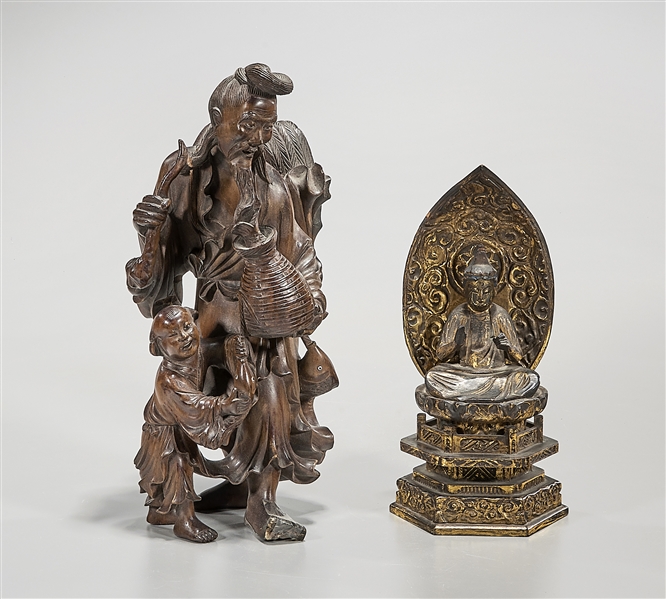 Appraisal: Two Chinese carved wood figures including lacquered seated Buddha along