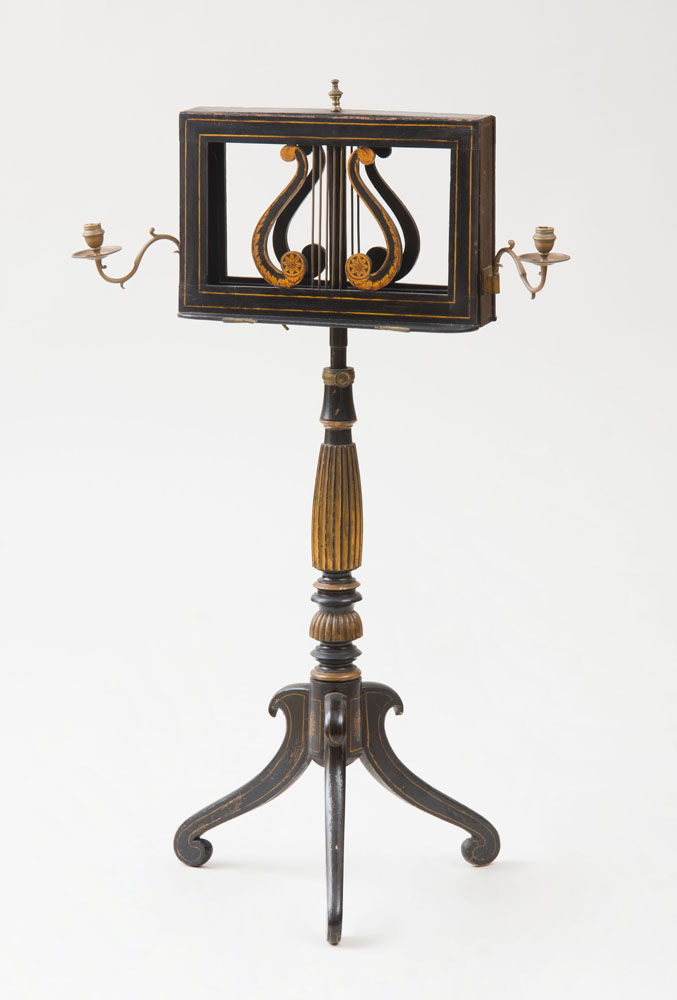 Appraisal: REGENCY EBONIZED AND PARCEL-GILT DUET MUSIC STAND Fitted with brass