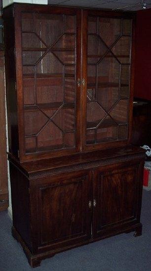 Appraisal: A th Century bookcase with astragal glazed doors above a