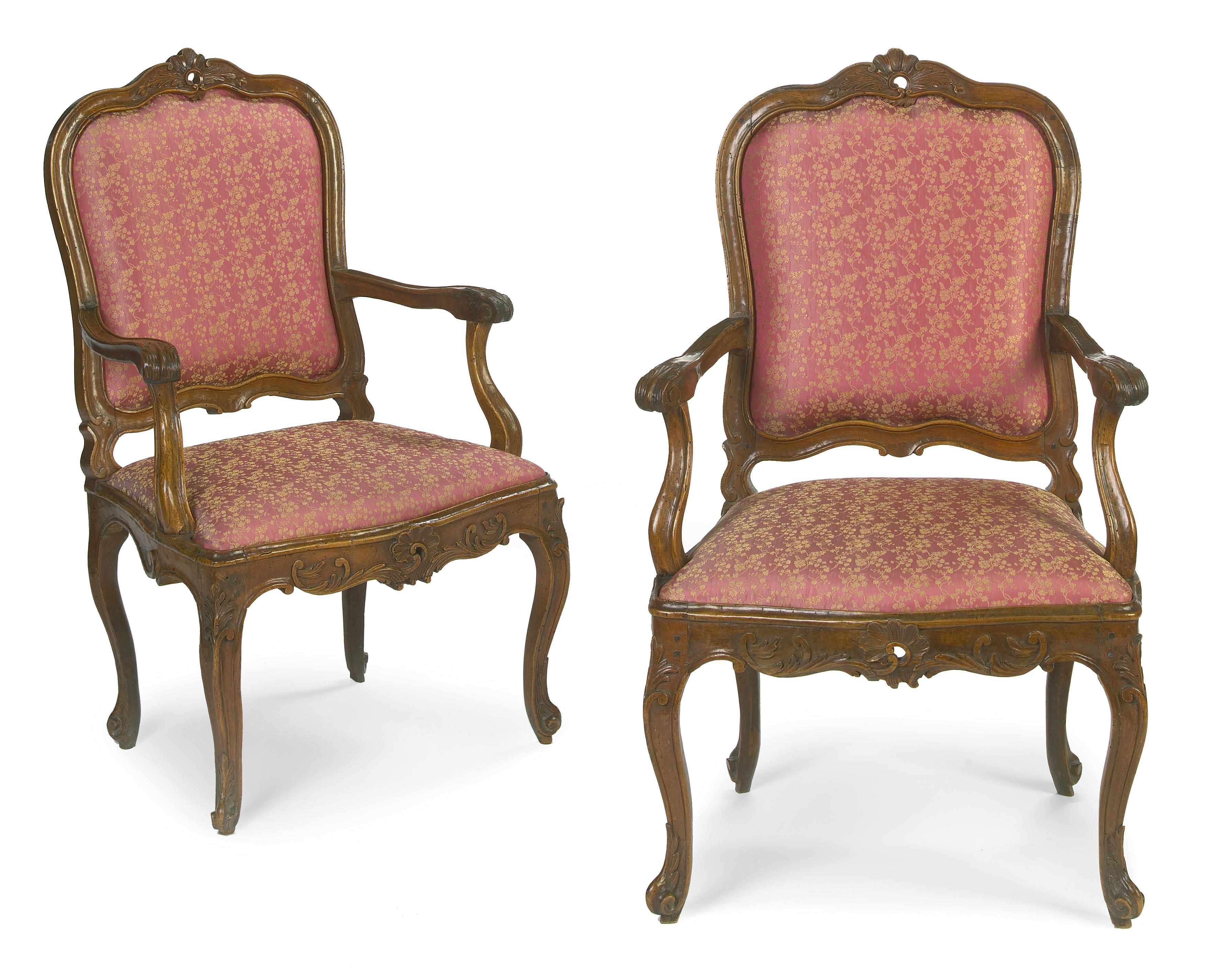 Appraisal: A pair of Italian Rococo carved walnut armchairs mid th