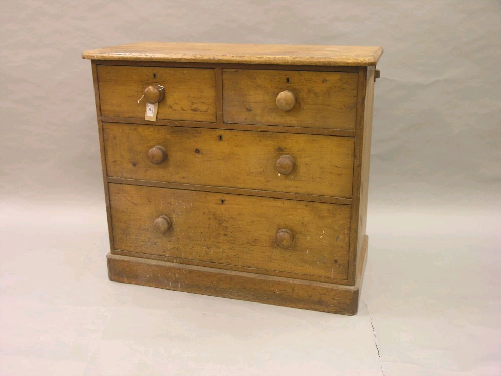 Appraisal: A small Victorian waxed pine chest two short and two