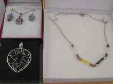 Appraisal: Two white metal test silver stone set necklaces together with