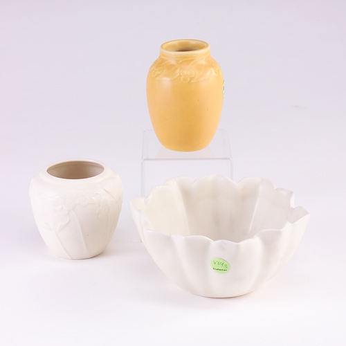 Appraisal: ROOKWOOD Three Production vessels a yellow ovoid vase with berries