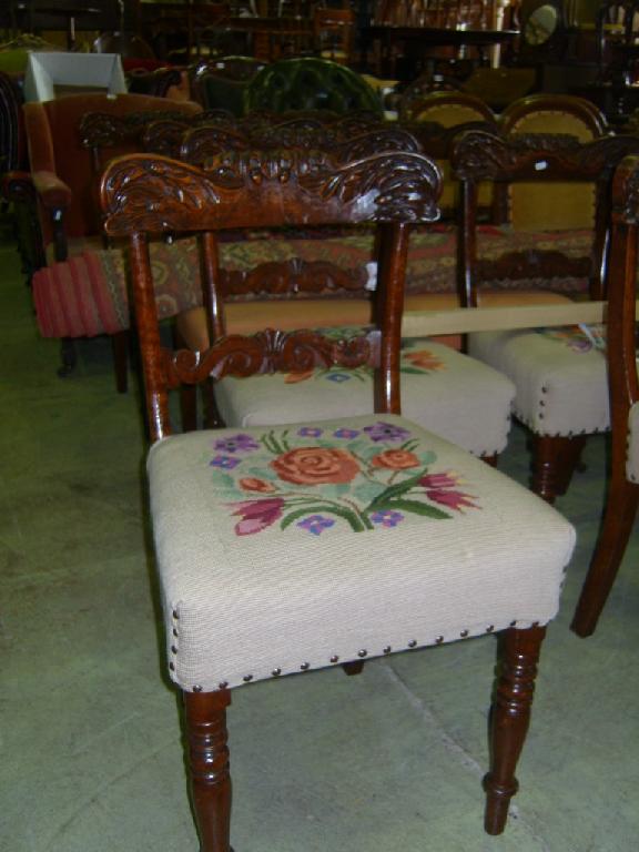 Appraisal: A set of eight Regency oak dining chairs the carved