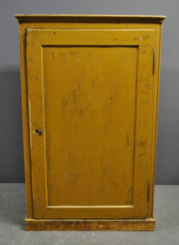 Appraisal: - Mustard yellow paint decorated cabinet th c with molded