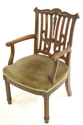 Appraisal: A mahogany open armchair in George III style the foliate