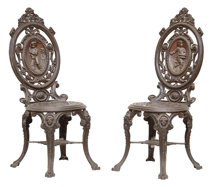 Appraisal: A PAIR OF CAST IRON GARDEN SEATS ATTRIBUTED TO COALBROOKDALE