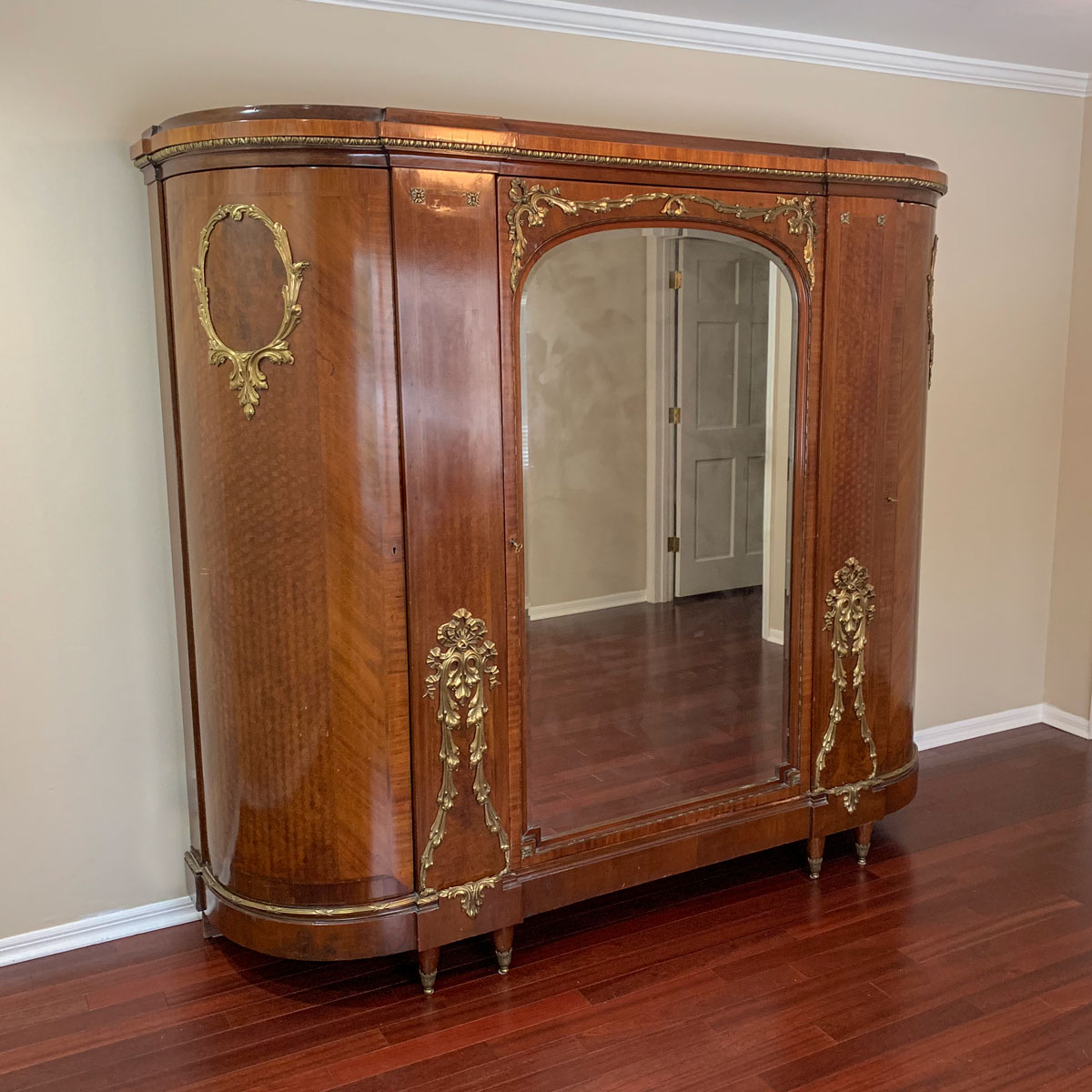 Appraisal: FRENCH METAL MOUNTED TRIPLE DOOR ARMOIRE Triple door French armoire