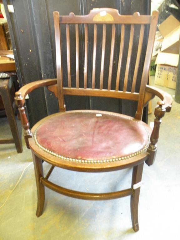 Appraisal: An Edwardian mahogany and inlaid open armchair