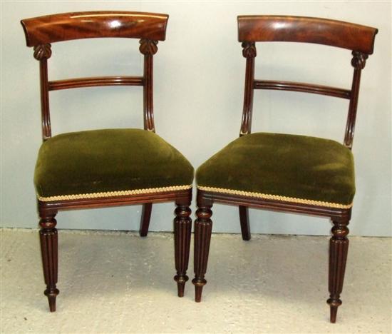 Appraisal: Pair of th century rosewood dining chairs on reeded legs