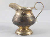 Appraisal: A Russian silver jug of bellied form Moscow Ht cm