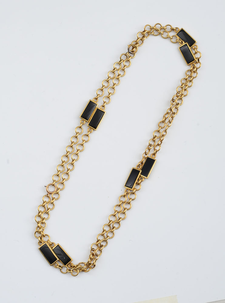 Appraisal: K GOLD AND BLACK ONYX LONG CHAIN VAN CLEEF ARPELS