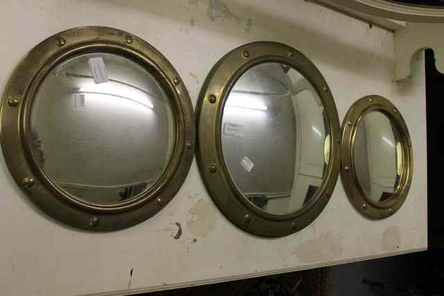 Appraisal: A PAIR OF BRASS FRAMED CIRCULAR CONVEX WALL MIRRORS diameter