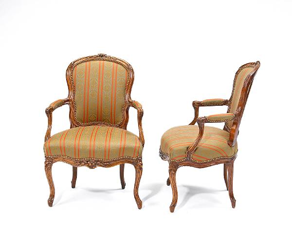 Appraisal: A pair of Louis XV walnut fauteuils en cabriolet Ph