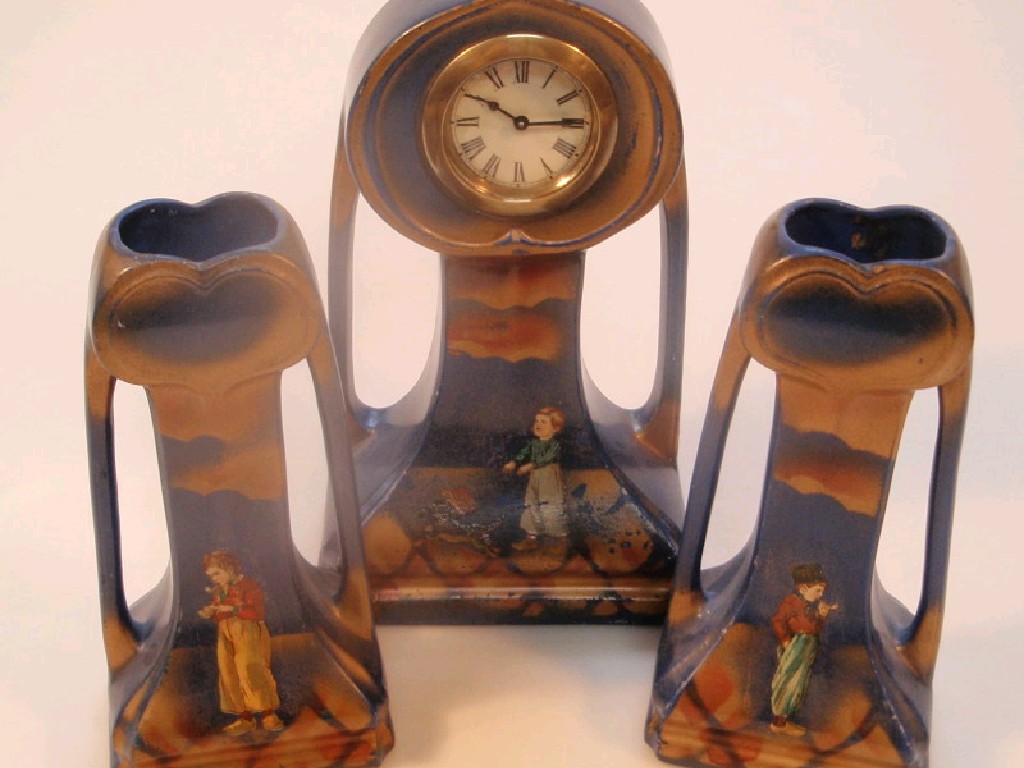 Appraisal: A Sylvac clock garniture with timepiece movement of art nouveau