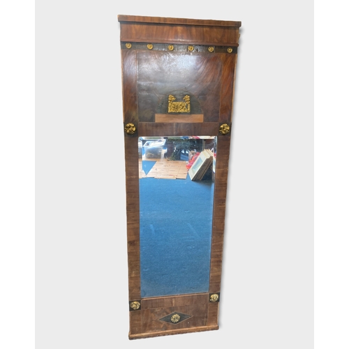 Appraisal: A th century full length Mahogany inlaid mirror With applied