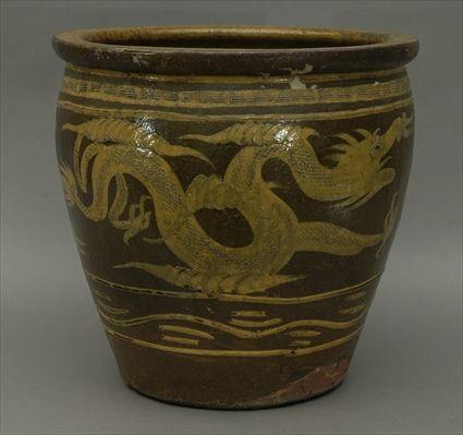 Appraisal: Chinese Brown-Ground Ceramic Jardiniere Decorated with Dragons in x in