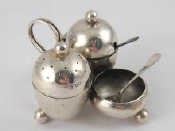 Appraisal: A three piece late Victorian silver cruet stand one liner