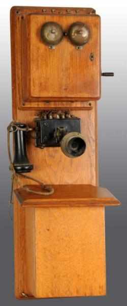 Appraisal: Oak Wall Telephone Description All original No batteries Ear receiver