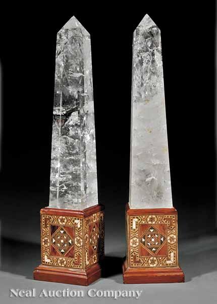 Appraisal: A Pair of Rock Crystal Obelisks on inlaid mosaic plinths