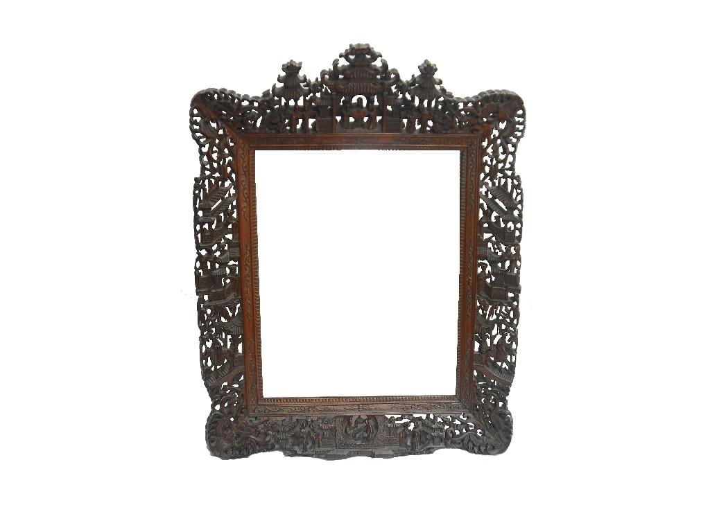 Appraisal: Fine th century Chinese hardwood mirror the raised pierced frame