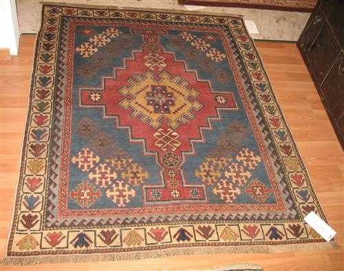 Appraisal: SHIRVAN antique Blue ground with a red central medallion white