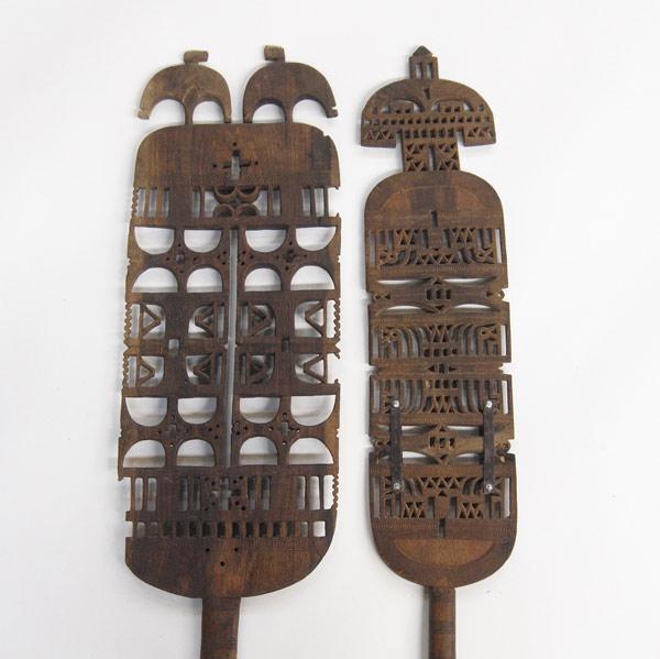 Appraisal: TUAREG CARVED TENT POSTS Two pieces with filigree bi-lateral carvings