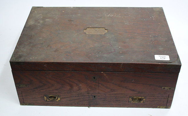 Appraisal: A VICTORIAN OAK CAMPAIGN TYPE WRITING BOX with brass mounts