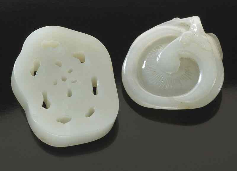 Appraisal: Chinese Qing carved white jade pendants lotus root lingzhi ''H