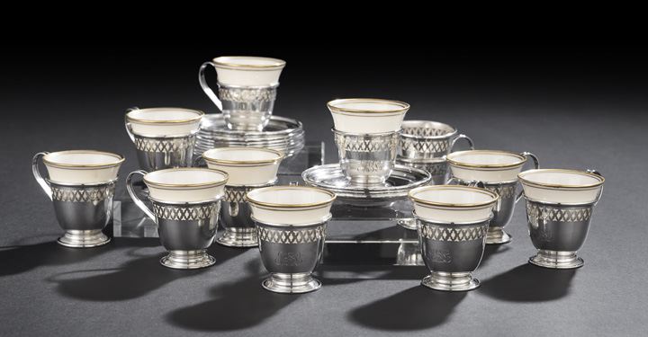 Appraisal: Set of American Sterling Silver and Porcelain Demitasse Cups and