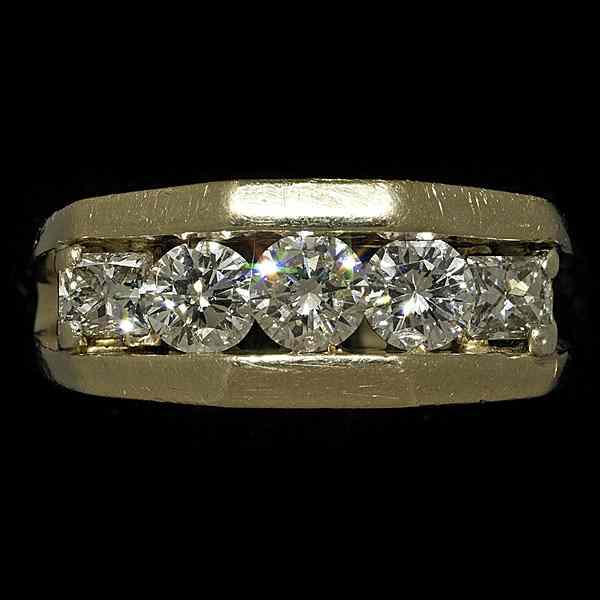 Appraisal: Gentleman's Step Diamond Ring A gentleman's K gold ring channel-set