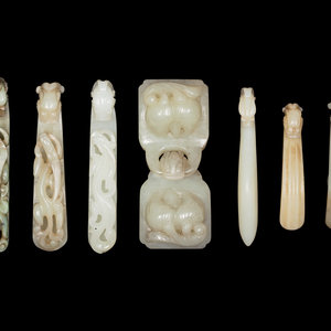 Appraisal: Seven Chinese Carved Celadon Jade Belt Ornaments comprising six dragon-head