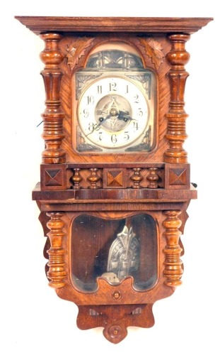 Appraisal: An Art Nouveau Indacta oak wall clock with carved column