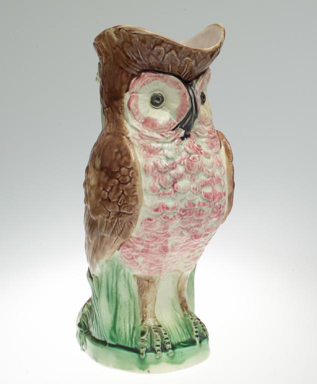 Appraisal: LATE th CENTURY MAJOLICA OWL JUG naturalistically modelled picked out