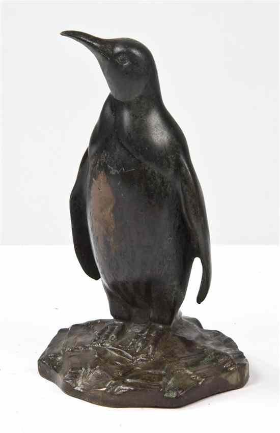 Appraisal: A Cast Bronze Animalier Group depicting a standing penguin unsigned