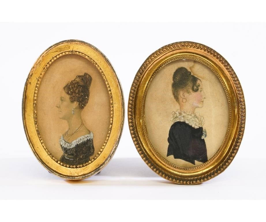 Appraisal: Pair of American miniature oval watercolor portraits of sisters circa