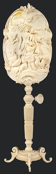 Appraisal: A Continental carved ivory candle screen late th century The