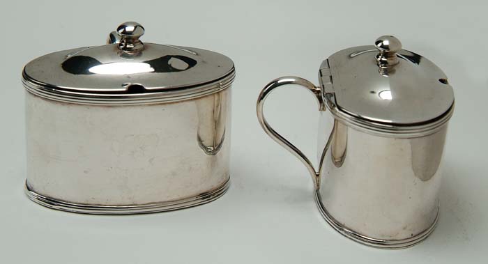 Appraisal: PAIR OF GEORGE III SILVER OVAL MUSTARD POTS John Emes