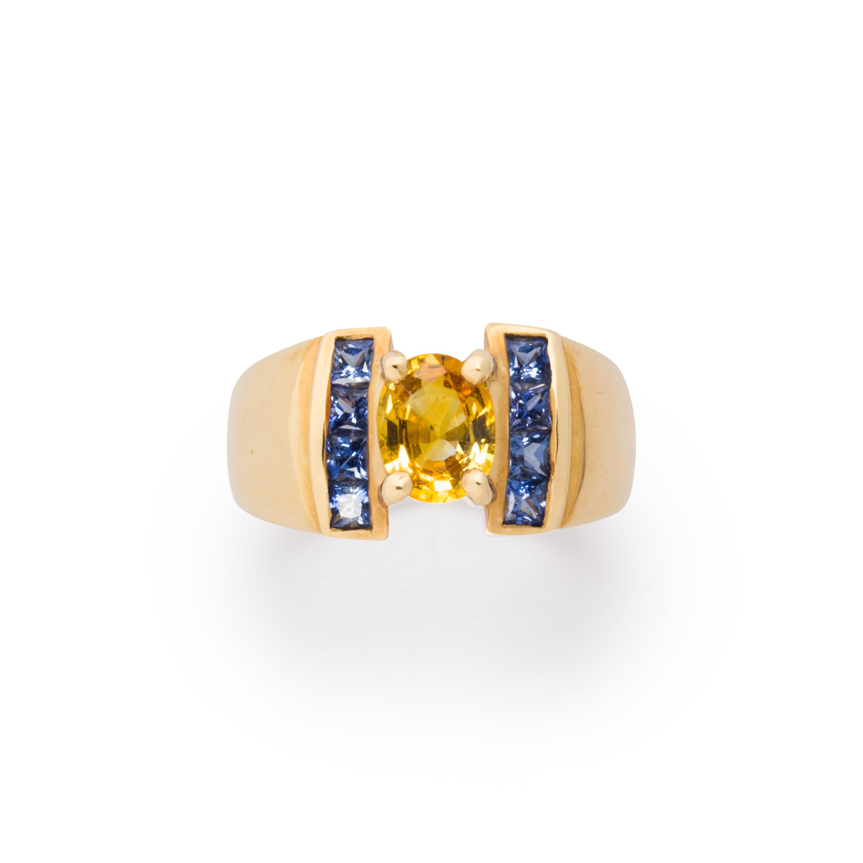 Appraisal: A YELLOW SAPPHIRE SAPPHIRE AND FOURTEEN KARAT GOLD RING A