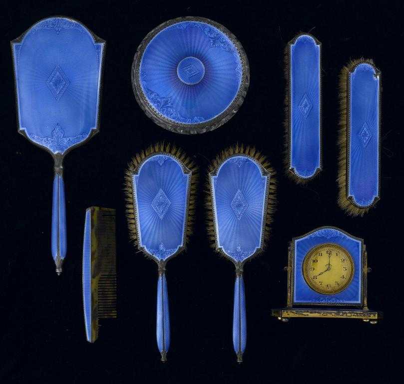 Appraisal: A GEORGE VI SILVER AND BLUE GUILLOCHE ENAMEL DRESSING SET